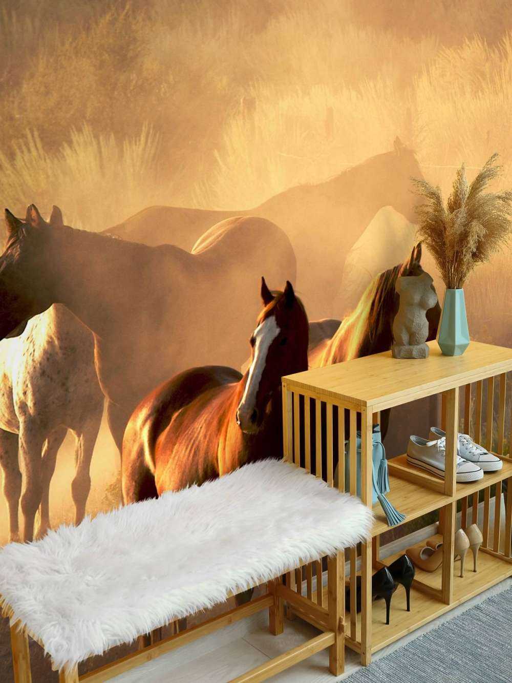 Heste under en solnedgang