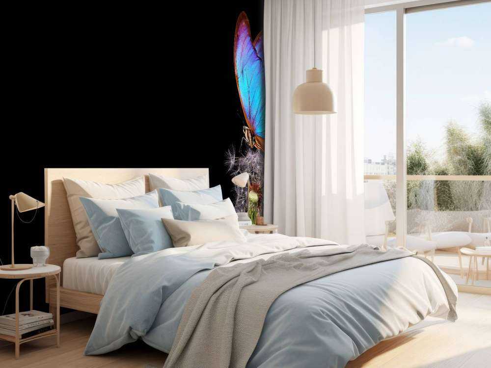 Blå sommerfugl på en løvetann