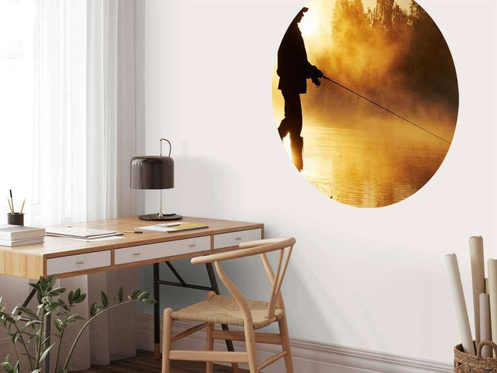 Fiskare vid soluppgång