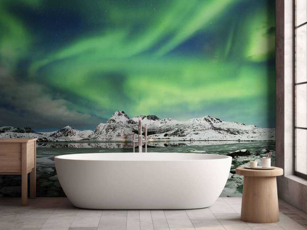 Norrsken över vinterlandskap